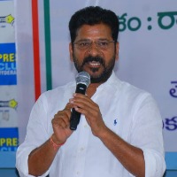 revanth reddy questions KTR over police lathi charge on farmers