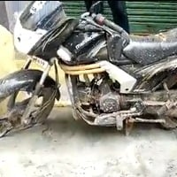 cement road laid with parked bike in tamilnadu