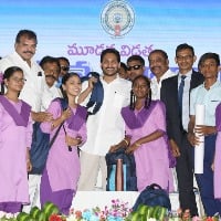 jagan pose to photographers with a school bag on his shoulders