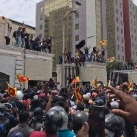 Protesters take dip in SL President's pool, others take WWE battles to PM's bed