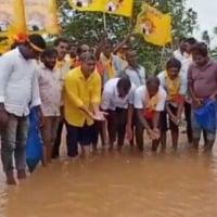 TDP Leaders protests on water logged roads in Kaikaluru constituency