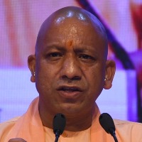 yogi cabinet in trouble one minister resigns another in delhi