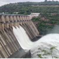 AP Irrigation Minister Ambati Rambabu lifts radial crest gates at Srisailam Project