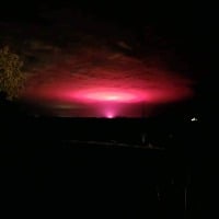 Australian town glows with pink light in the sky