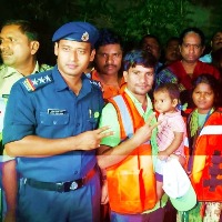 NDRF rescues family stuck in flood waters in Hyderabad