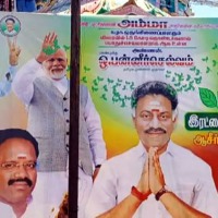 Is Panneerselvam mulling BJP move hoarding rises questions