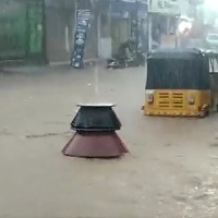 Biryani pots float away in flood waters