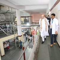 union home minister amit shah visits kmf dairy in bengaluru