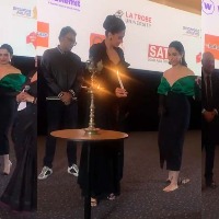Tamannaah takes off her shoes on stage to light up lamp impressed fans say she learnt it in South India
