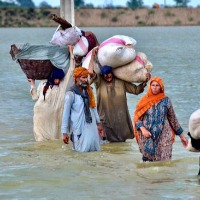 India reportedly discusses toextend food assistance to flood hit Pakistan