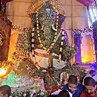 chevireddy bhaskar reddy offers a laddu which weighs 1116 kilos to pineapple vinayaka idol in tummalagunta