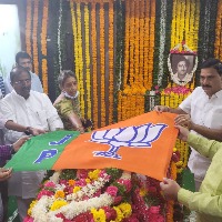 BJP flag on Krishnam Raju mortal remains
