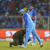 Fan breaches security to enter ground touch Rohit Sharma feet during 1st T20I