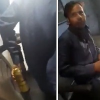 Teacher drinking beer while teaching students in UP