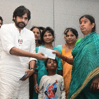 Pawan Kalyan distributes cheques to deceased Janasena active members families