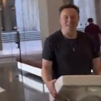Musk visits Twitter HQ, with a sink in his hand