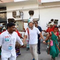 Rahul Gandhi shakes a leg with tribals in Telangana