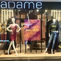  MADAME stores draped in bright colours and lighting this festive season