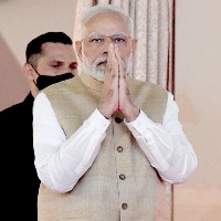 PM Modi arrives in Vizag, holds roadshow