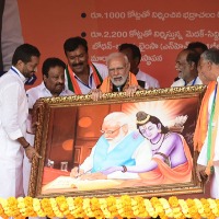 Dubbaka MLA Raghunandan Rao gifts a portrait to PM Modi