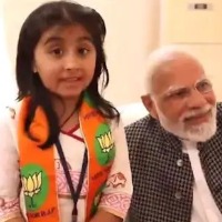 Thought he was my grandpa Young girl who praised BJP with PM Modi by her side