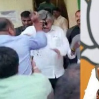 Man throws ink at Maharashtra minister Chandrakant Patil 