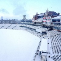 Oval cricket ground filled with snow