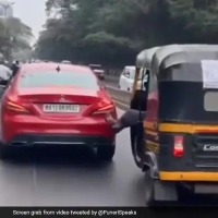 Auto Driver Pushes Mercedes With His Leg
