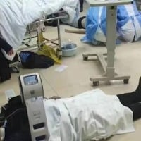 Patients given CPR on floor doctors collapse from exhaustion as Covid sweeps China vedio Watch