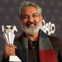 CCA2023: S.S. Rajamouli poses with award