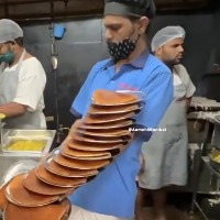 Olympic sport Anand Mahindra is impressed with waiters plate balancing skills tweets video