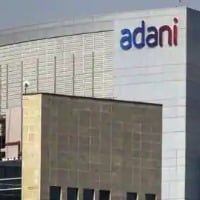 Adani group firms pledge shares for lenders of flagship company sbi cap trustee