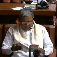 Karnataka Congress Leaders Wear Flower Behind Ear On Day Of Budget