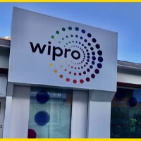 Wipro cuts freshers pay by 50 per cent