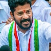 Tpcc president revanth reddy responded seriously on dogs attack in Hyderabad