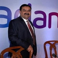 Adani Group pre pays rs 7374 crores loan advance