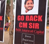 posters saying cm go back in visakha