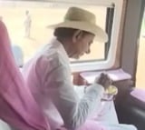 KCR eats pulihora and curd rice in bus