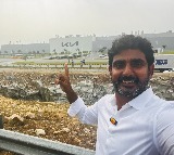 Nara Lokeshs selfie with Kia industry and tweet against Jagan
