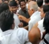 MLA Kannababu slaps one of the locals while on a visit to Poodimadak in Anakapalli district