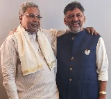 Siddaramaiah, Shivakumar arrive in Bengaluru to rousing welcome