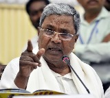 Siddaramaiah take oath and sign on five assurances 