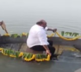 Gangula Kamalakar fells into water from boat