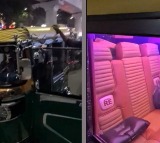 Auto with car like seats colourful lights wows people