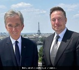 worlds two richest people elon musk bernard arnault meet for lunch in paris