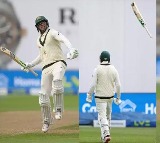 usman khawaja throws his bat air celebrate his 1st test century vs england 