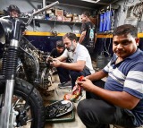 Rahul Gandhi interacts with bike mechanics in Delhi