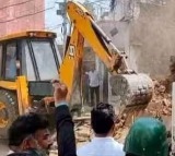 Bulldozer action against rape murder accused in UPs Fatehpur vedio