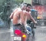 Bikers take bath in rain while riding in uttarpradesh