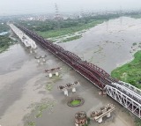 Delhi suburbs on the edge of flood as Yamuna swells dangerously 